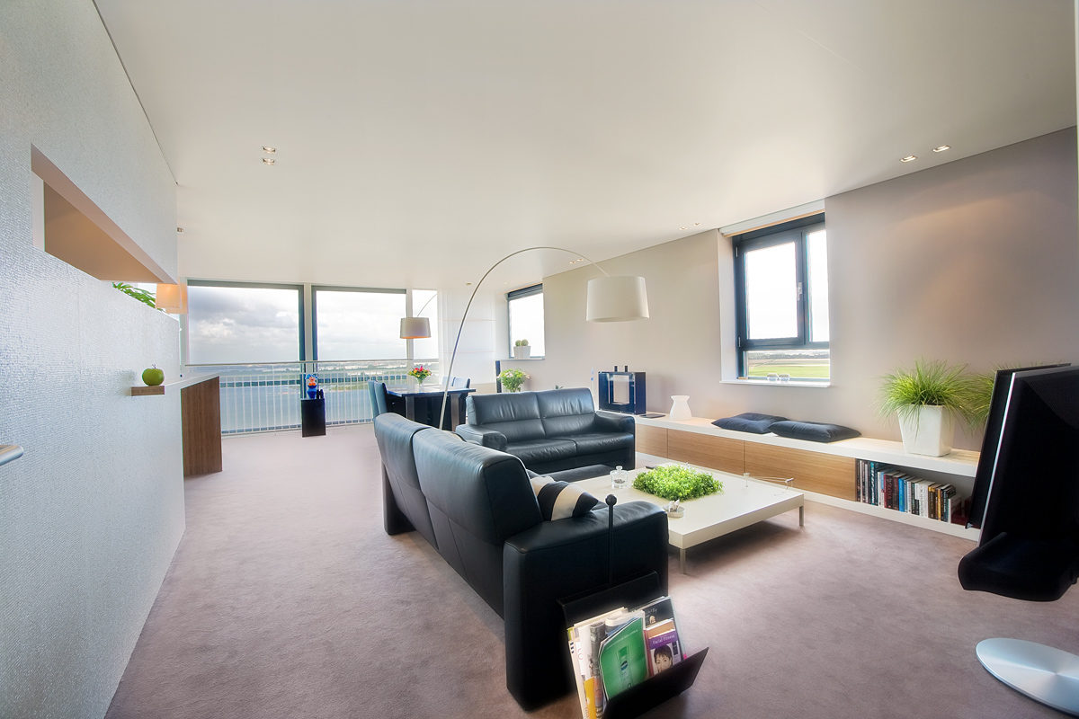 Aranżacja mieszkania w stylu loft - nowoczesny, przestronny salon